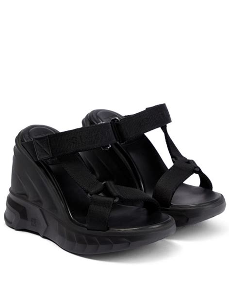 Marshmallow wedge sandals in black 